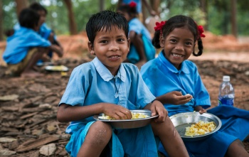 Children eating Mary's  Meals in India